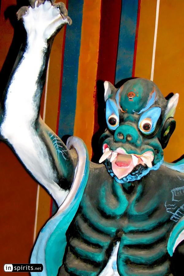 In Beijing's Dongyue Temple, a Taoist demon raises his claw
