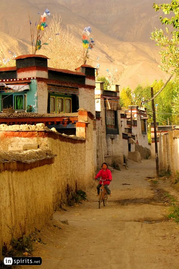 A Tibetan girl's bike tour in autumn