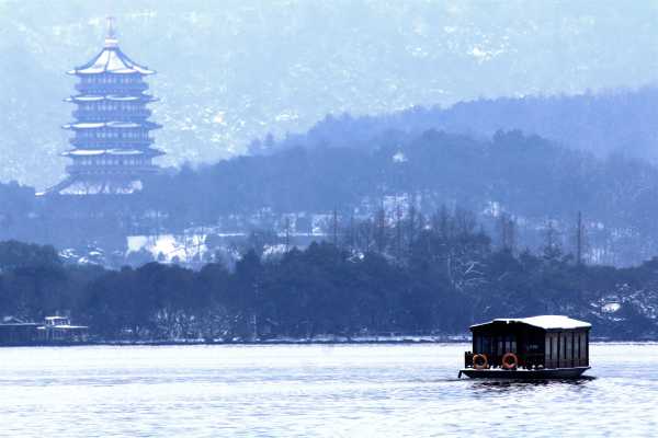 Chinese Boat on icy West Lake in Winter