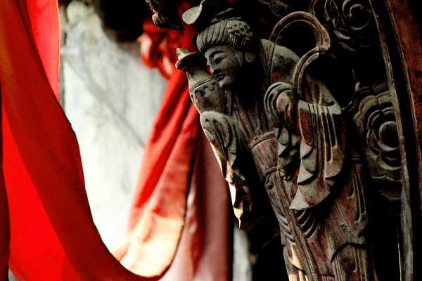 Wood carving on a house in the water town Wuzhen